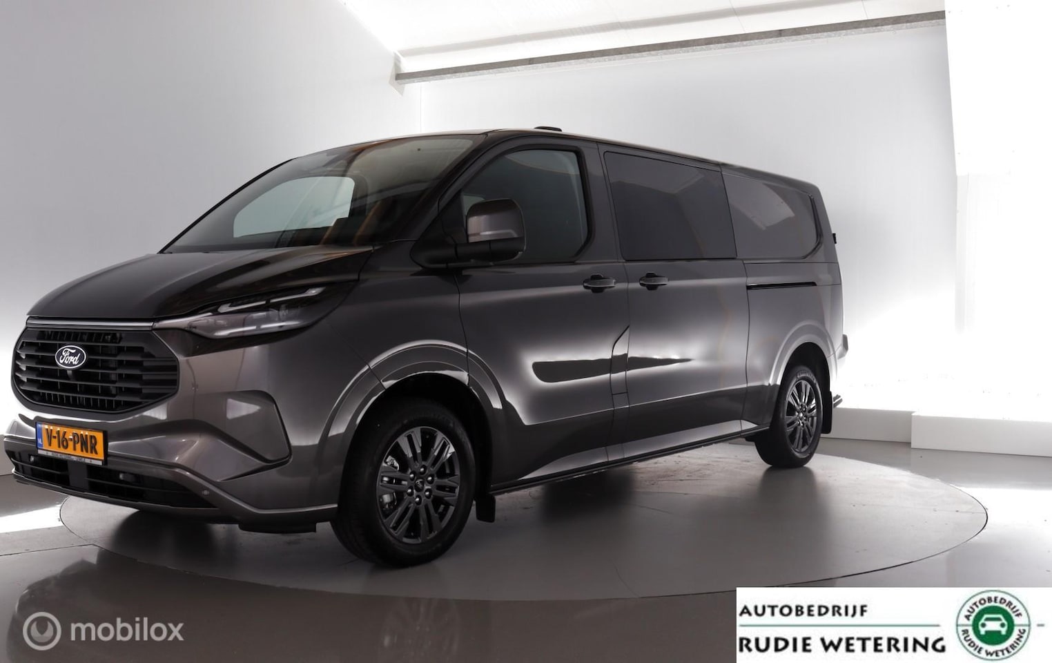Ford Transit Custom - 320 2.5 PHEV L2H1 Limited DC trekhaak|2xschuifdeur|nav|cam|acc|lmv17 - AutoWereld.nl