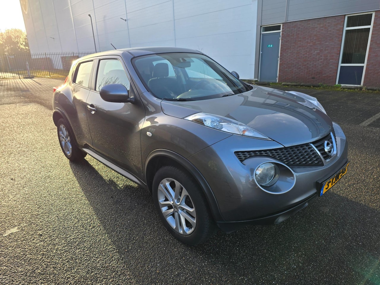 Nissan Juke - 1.6 Acenta Airco Navi Automaat Boekjes - AutoWereld.nl