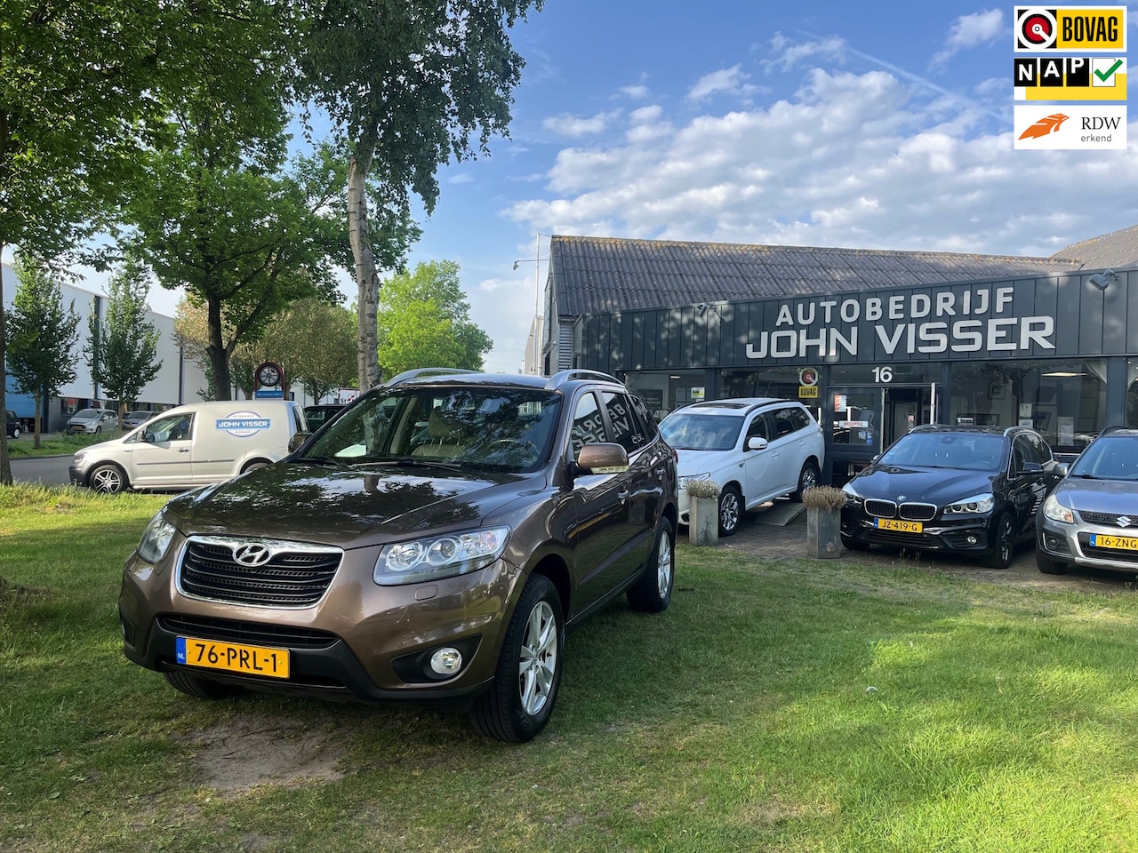 Hyundai Santa Fe - 2.4i CVVT 4WD Style * SUV * airco * cruise * navi * super ruim & robuust - AutoWereld.nl