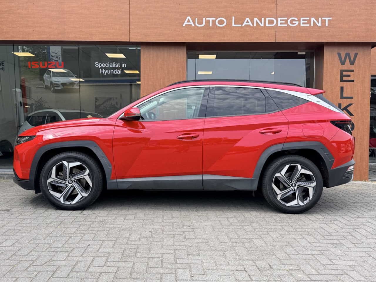 Hyundai Tucson - 1.6 T-GDI HEV Comfort Plus Sky | Schuif/Kanteldak | Trekhaak | Add. Cruise control - AutoWereld.nl