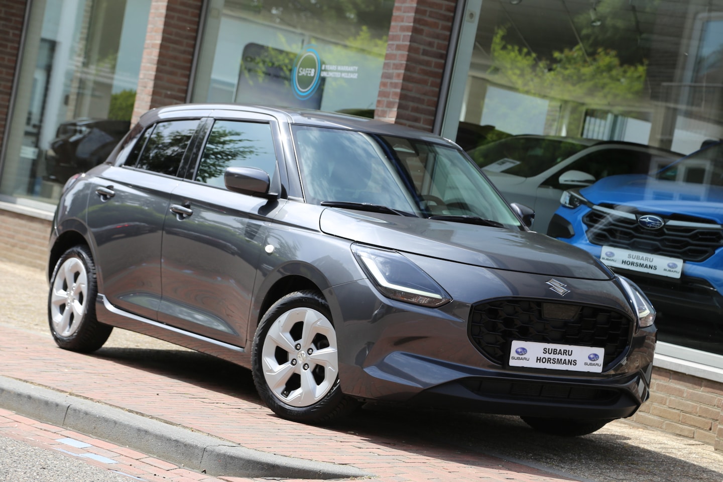 Suzuki Swift - 1.2 Style Smart Hybrid Navi LED Camera ACC - AutoWereld.nl