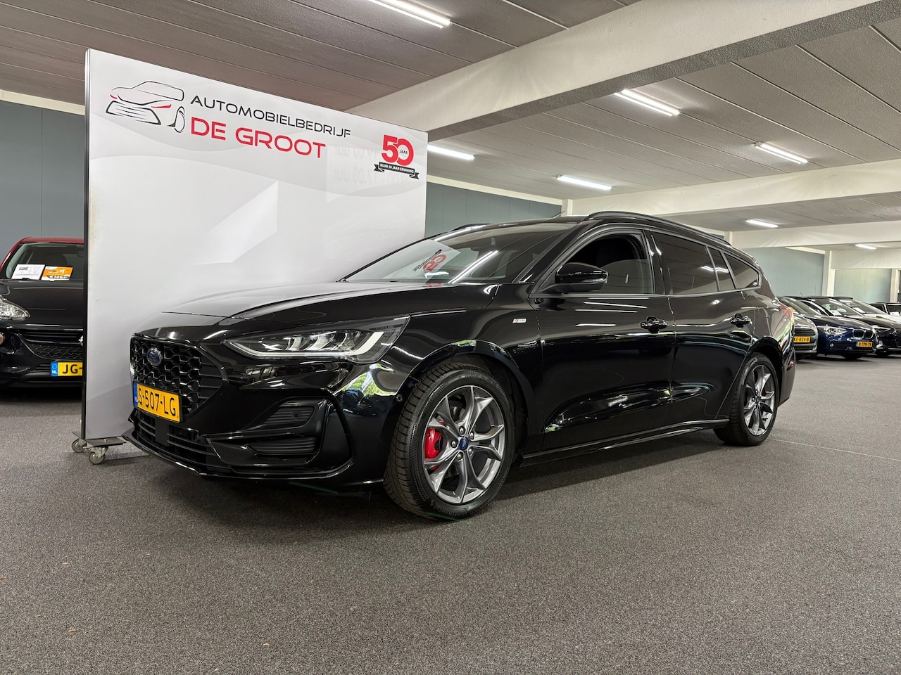 Ford Focus Wagon - 1.0 EcoBoost Hybrid ST Line Style/ NL auto/ Achteruitrijcamera/ Sensoren - AutoWereld.nl