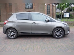 Toyota Yaris - 1.5 Full Hybrid 100pk 5D Aut Orange Sport