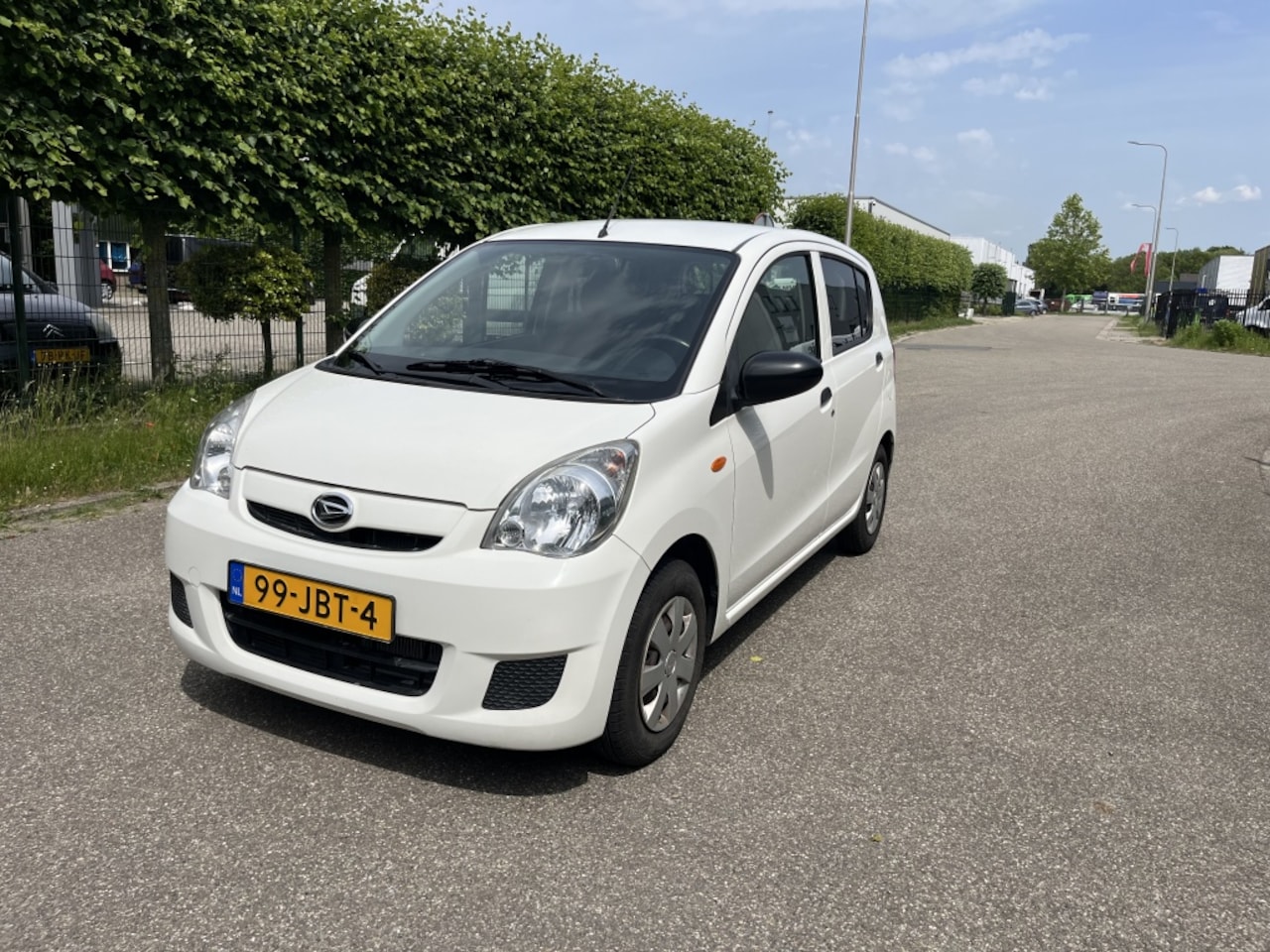 Daihatsu Cuore - 1.0 Premium Automaat 5D Elektr pakket Apk - AutoWereld.nl