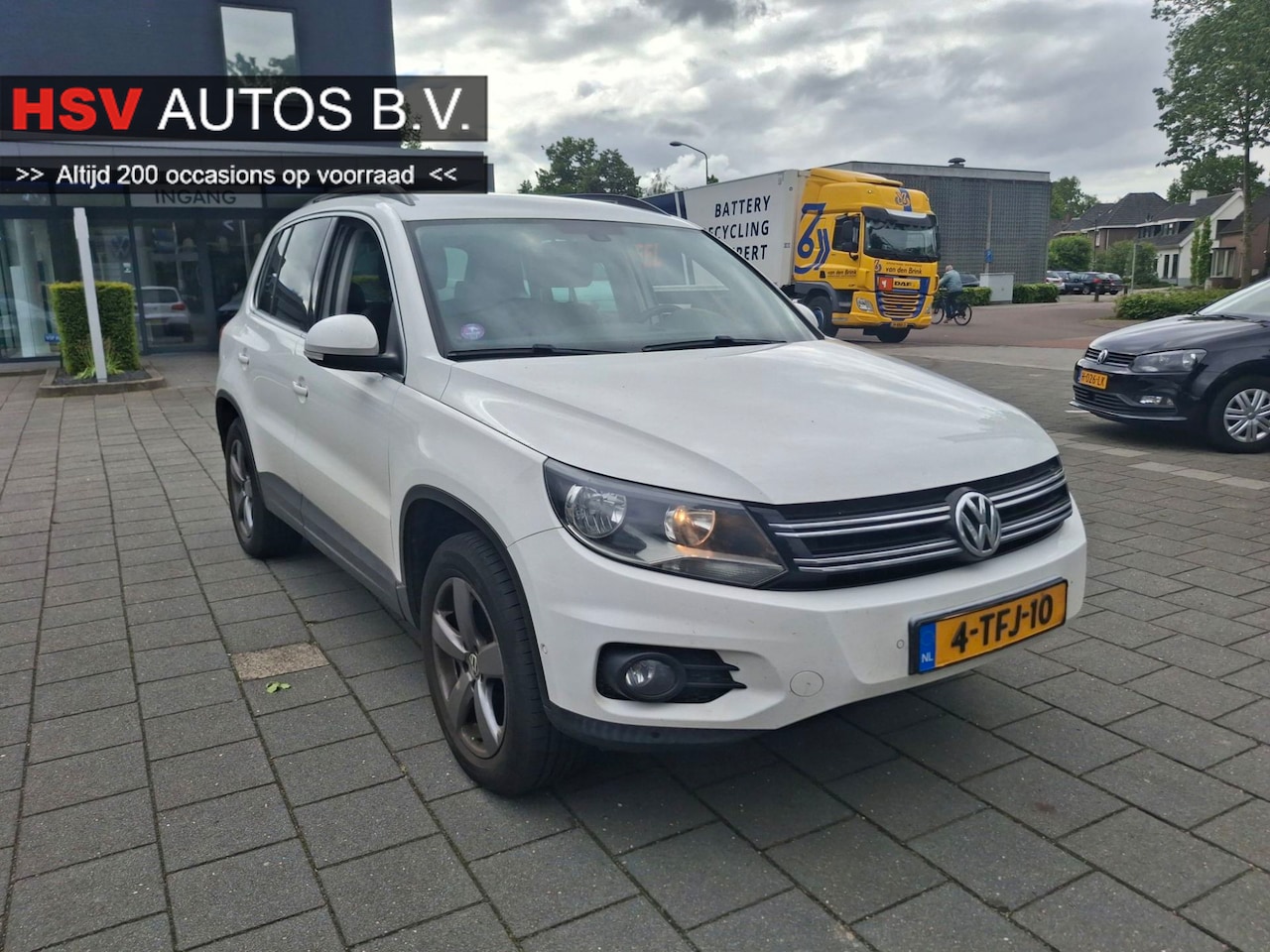 Volkswagen Tiguan - 2.0 TSI Sport&Style 4Motion navi LEER automaat - AutoWereld.nl