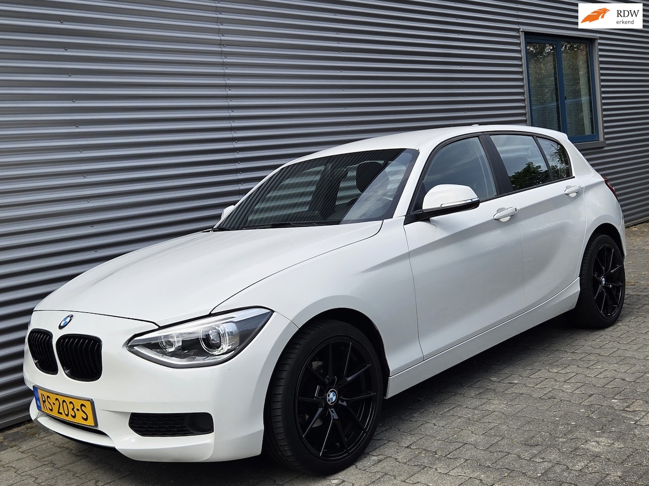 BMW 1-serie - 114i EDE 07-2014 Alpinweiss III 18inch M wielen!! - AutoWereld.nl