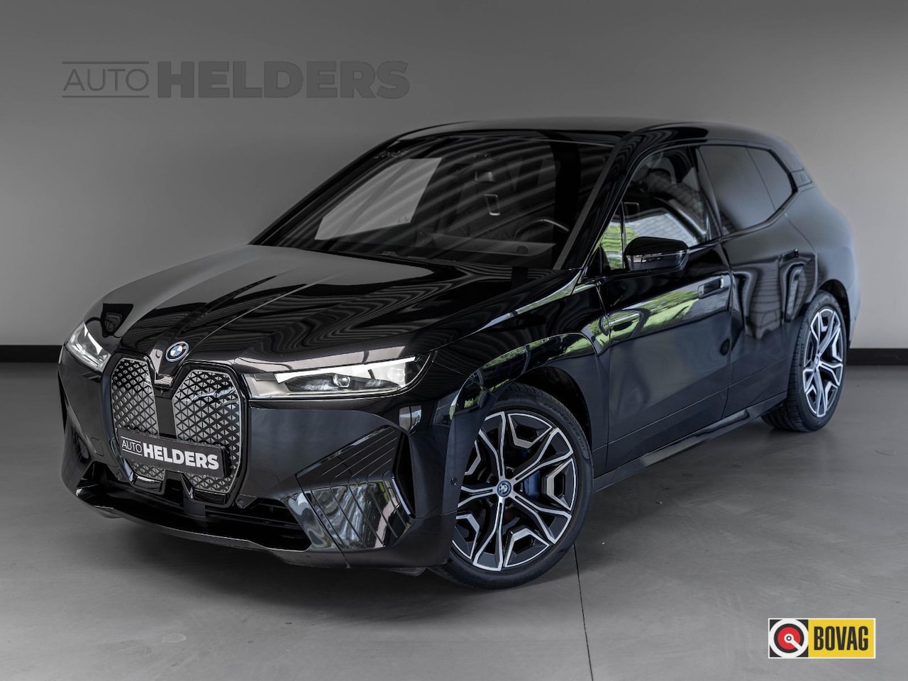 BMW iX - xDrive40 High Executive 77 kWh M Pano ACC 360° H&K - AutoWereld.nl
