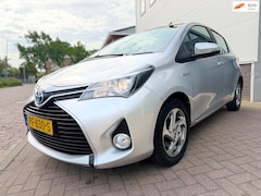 Toyota Yaris - 1.5 Hybrid Lease Limited Bi-Tone/Automaat/Navi/Camera/Climate-c/Goed-onderhouden