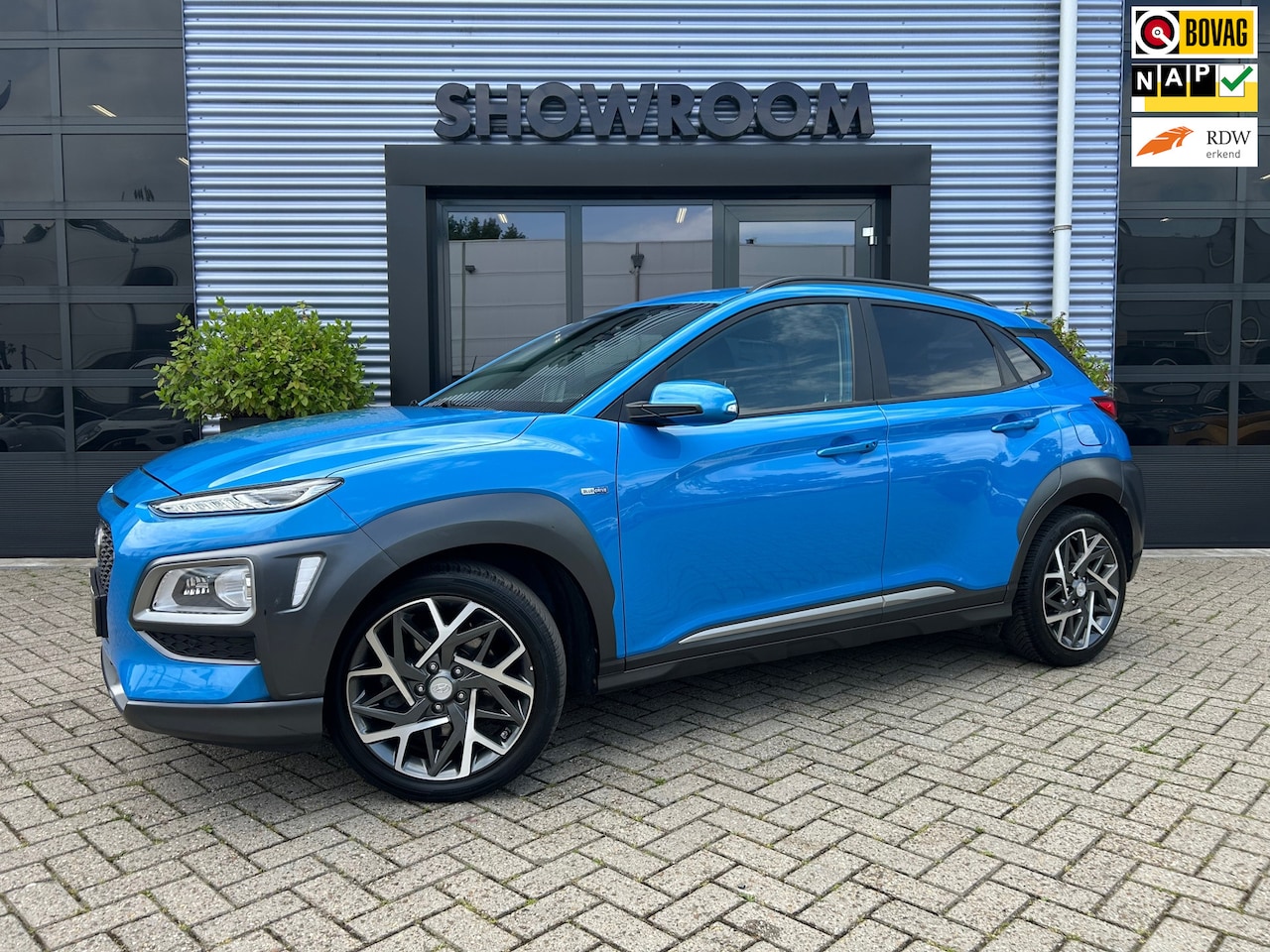 Hyundai Kona - 1.6 GDI HEV Premium Automaat|Trekhaak|Camera|Navi|Stoelverwarming / ventilatie/Stuur|Leer - AutoWereld.nl