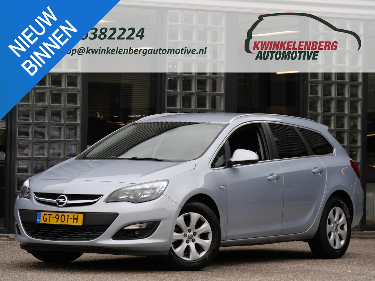 Opel Astra Sports Tourer - 1.4T BLITZ/ NAVI/ ALL-SEASON BANDEN/ APK MEI 2027 - AutoWereld.nl
