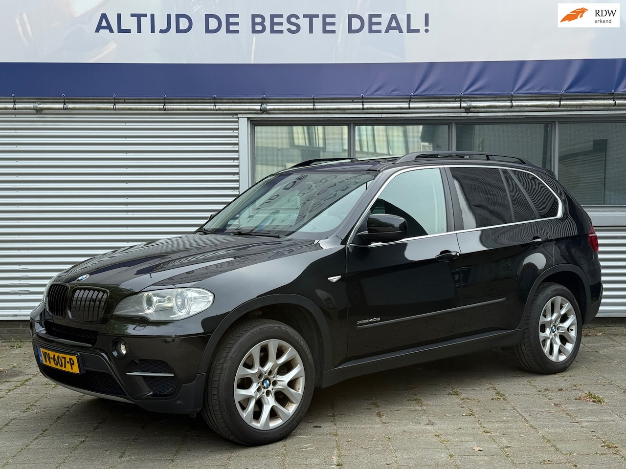 BMW X5 - 4.0d xDrive High Executive Grijs Kenteken l Pano l Leder l Navi l Cruise l Xenon l - AutoWereld.nl
