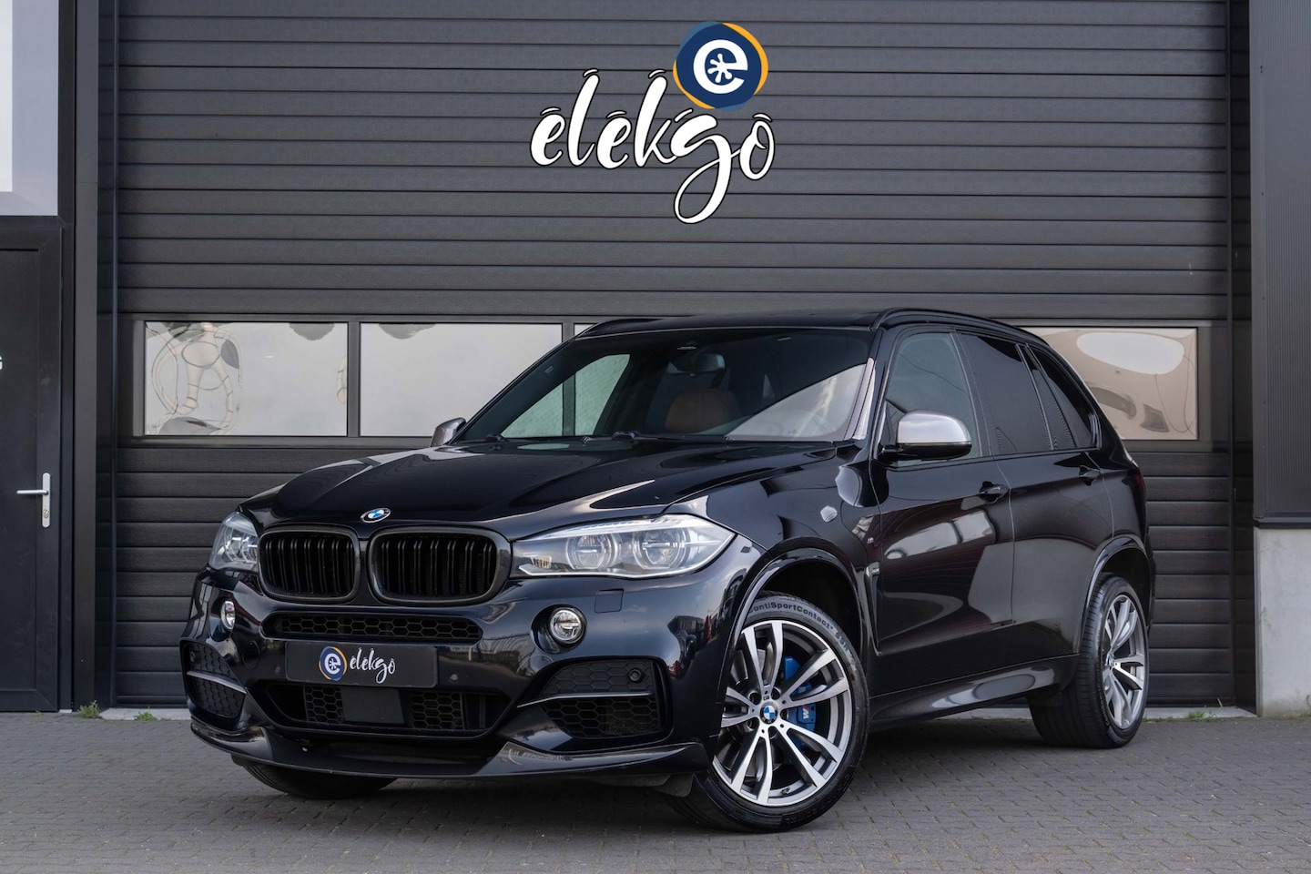 BMW X5 - M50D 381PK|Grijs kenteken|CARBON|HuD|Pano|Trekhaak|Stuur verwarmd| - AutoWereld.nl