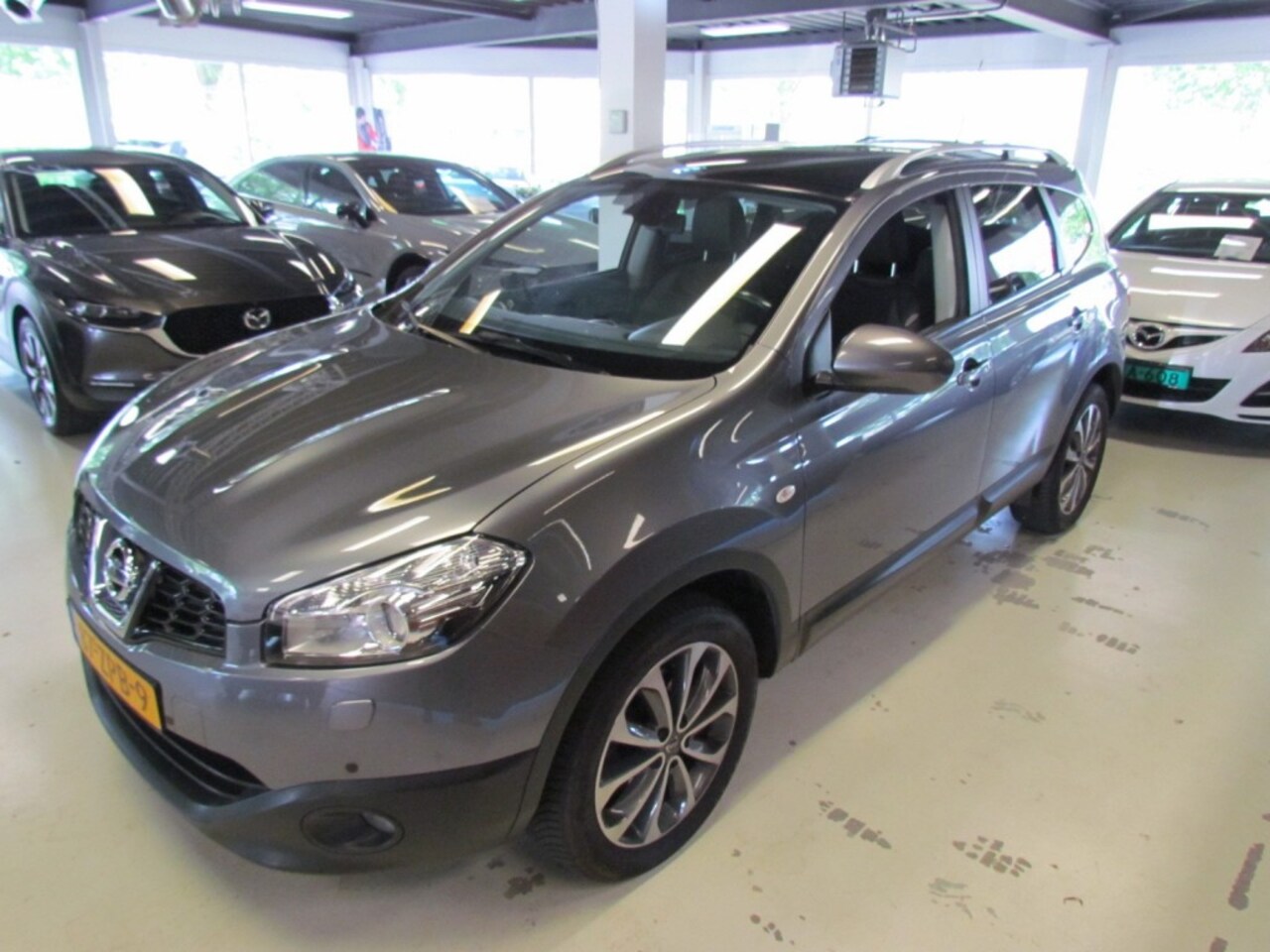 Nissan Qashqai+2 - 2.0 141pk Automaat 4WD Tekna All Season Trekhaak Panoramadak - AutoWereld.nl