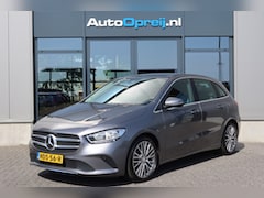 Mercedes-Benz B-klasse - B180 Premium Plus AUTOMAAT, NAVI, Camera, Trekhaak, half Leder
