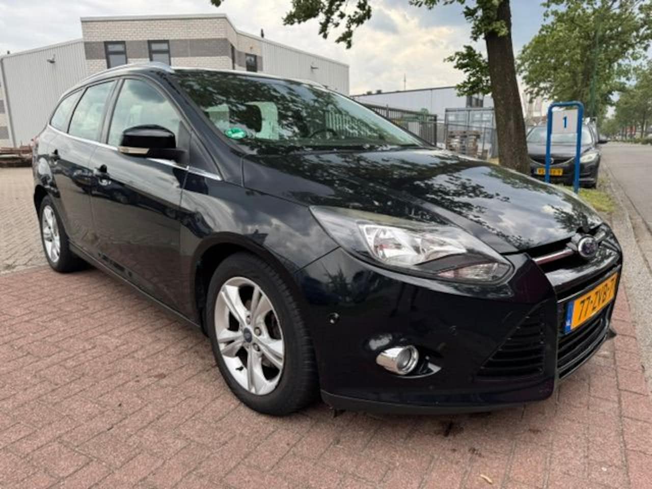 Ford Focus Wagon - 1.6 TDCI Lease Titanium Airco/ECC,Navigatie - AutoWereld.nl