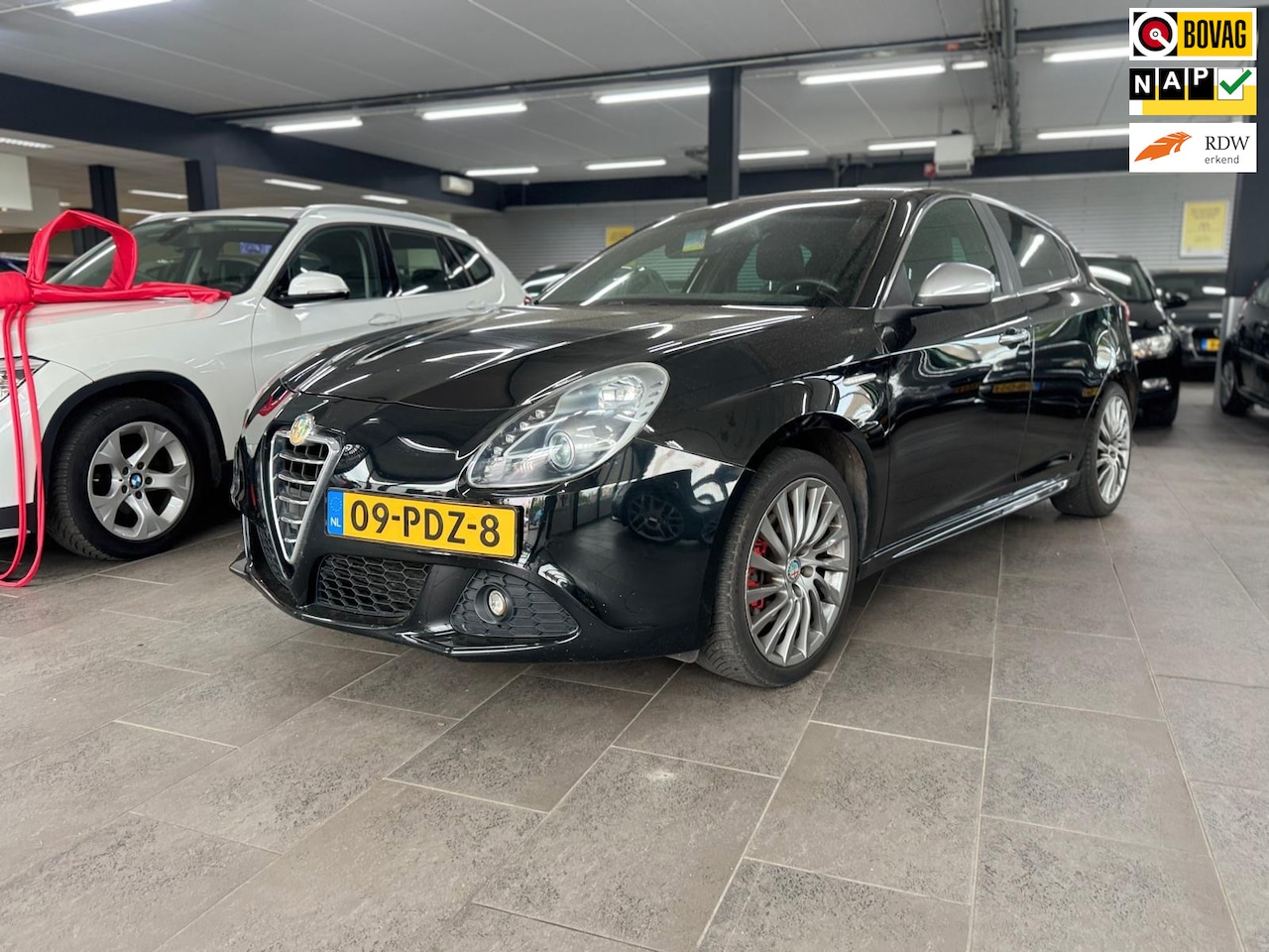 Alfa Romeo Giulietta - 1.4 T Distinctive half leer navigatie CarPlay dag light clima cruise controle om-velgen pa - AutoWereld.nl