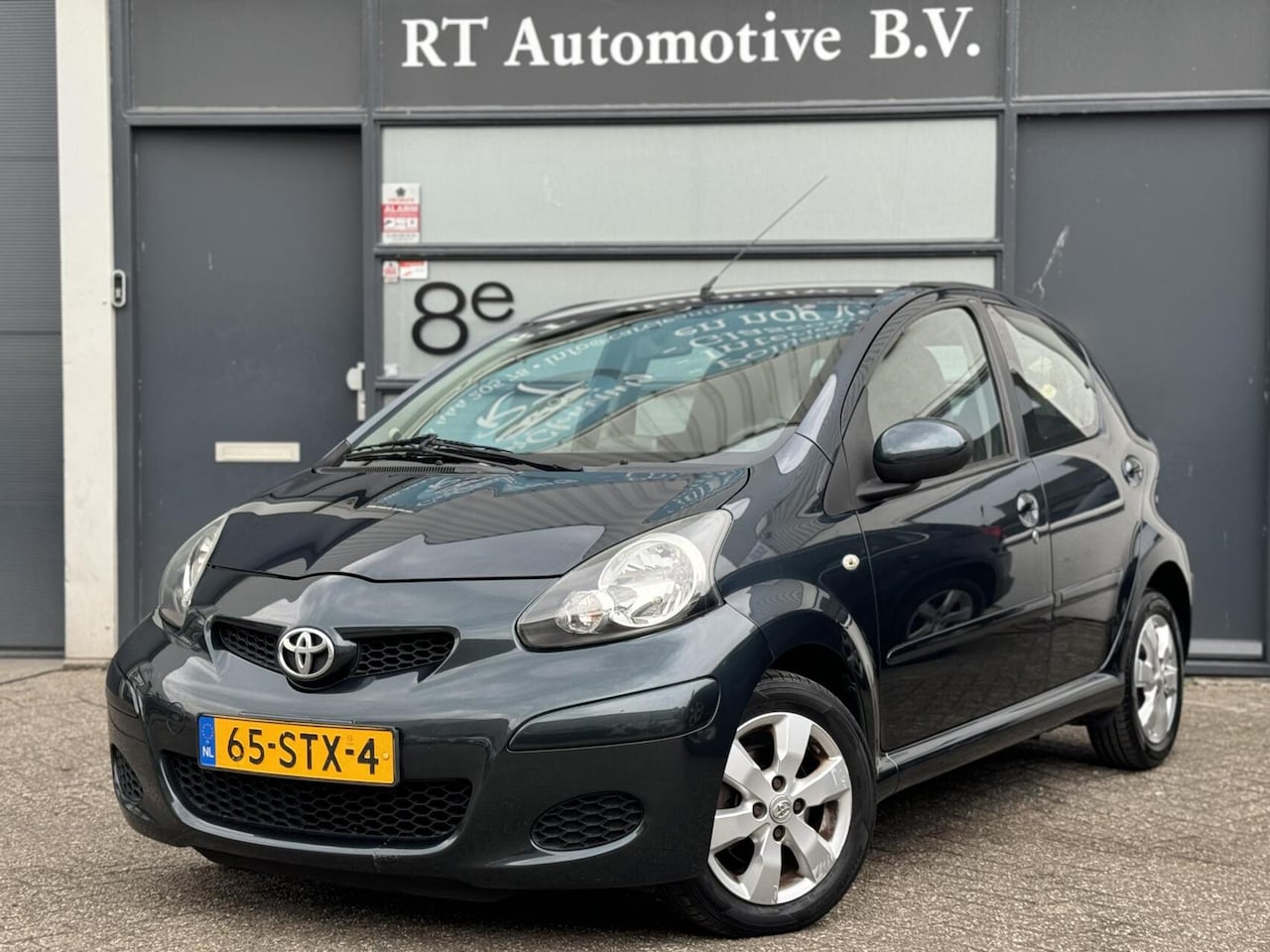 Toyota Aygo - 1.0 VVT-i Aspiration Leder / Navi / LM Velgen - AutoWereld.nl