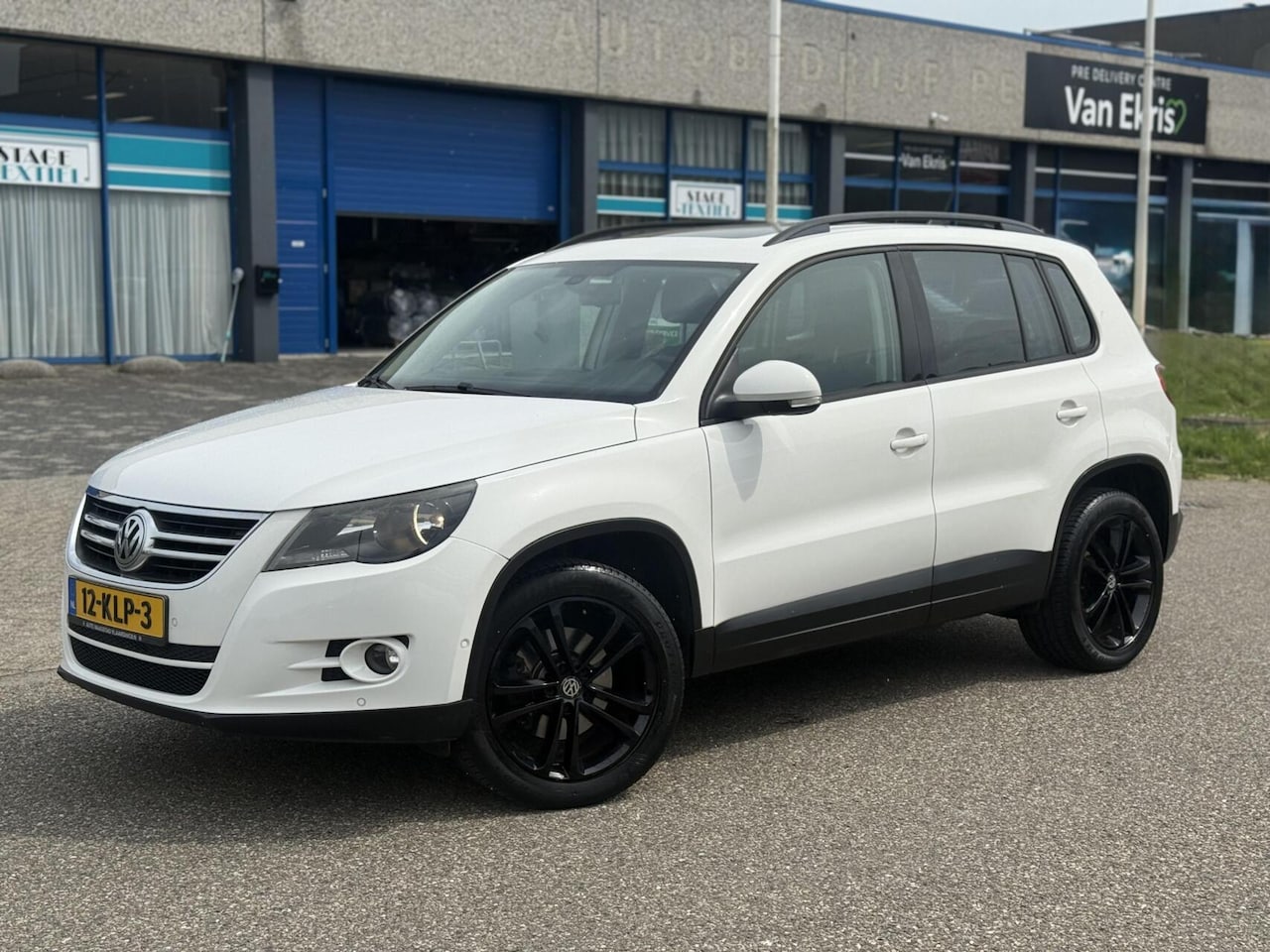 Volkswagen Tiguan - 1.4 TSI 4Motion Pano Navi Trekhaak Cruise - AutoWereld.nl