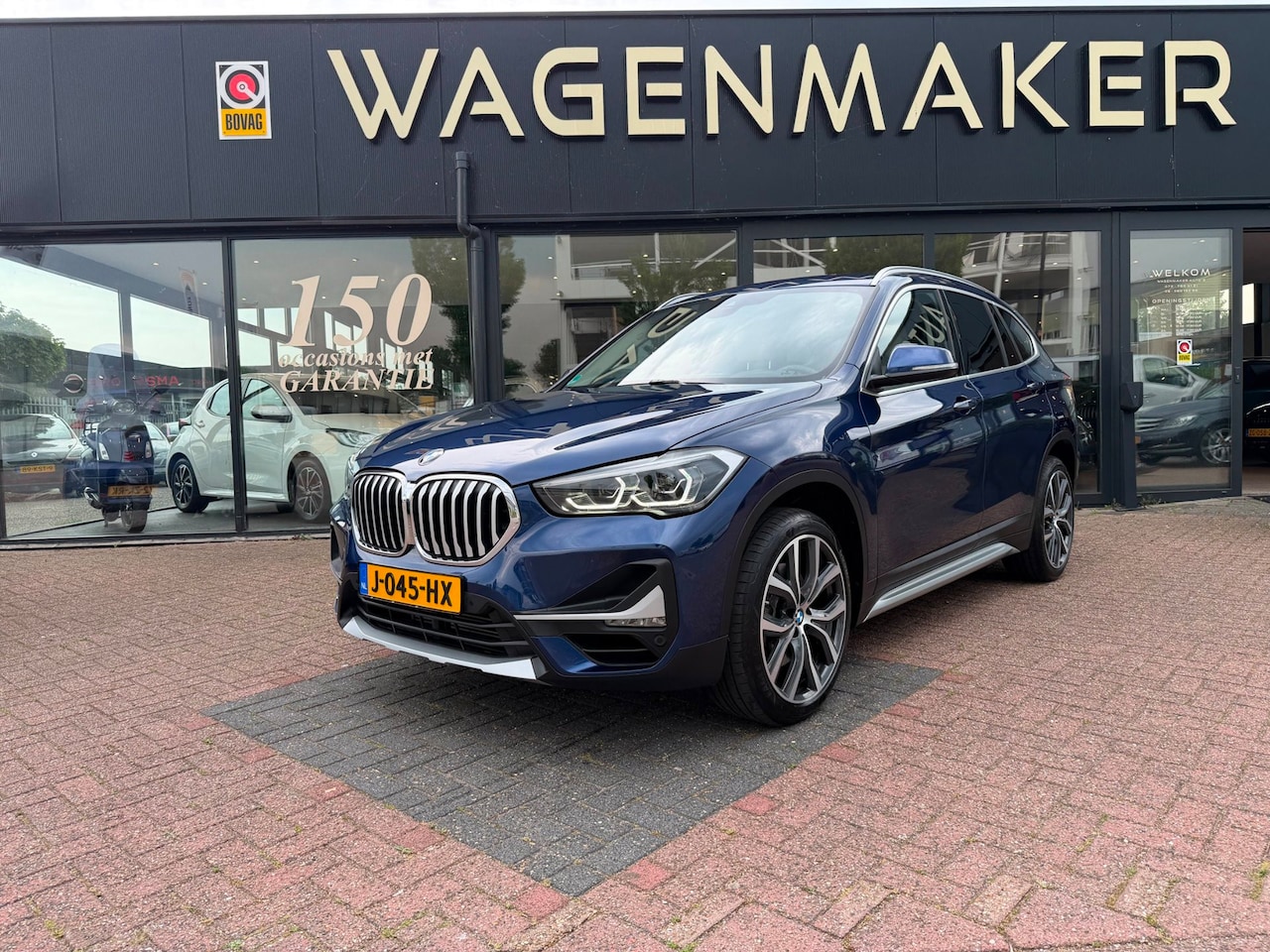BMW X1 - SDrive20i High Executive AUT|Nav|Leder|DEALERONDERHOUDEN - AutoWereld.nl