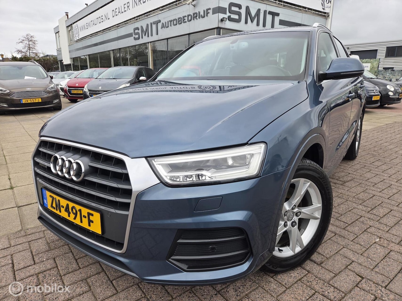 Audi Q3 - 2.0 TFSI Quattro Sport Pro 220PK Pano/Camera/Trekhaak - AutoWereld.nl