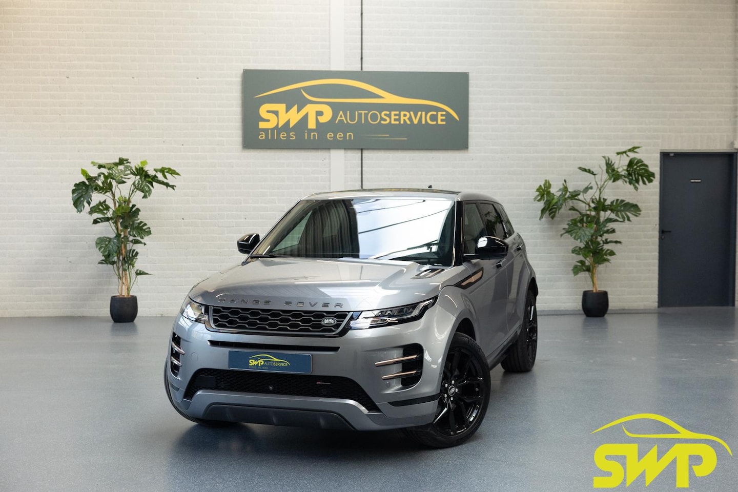Land Rover Range Rover Evoque - 1.5 P300e AWD R-Dynamic SE | Rose goud lijsten | Pano | 360 camera | 20 inch | Navigatie | - AutoWereld.nl