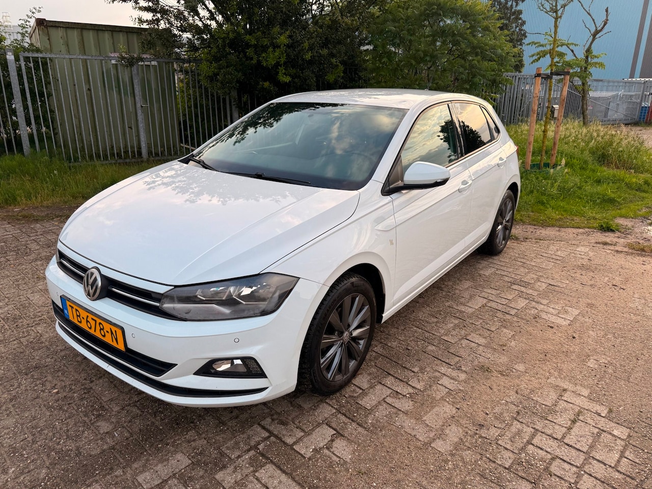 Volkswagen Polo - 1.0 TSI 95pk Navi |Cruise| Leder |P.sensoren - AutoWereld.nl