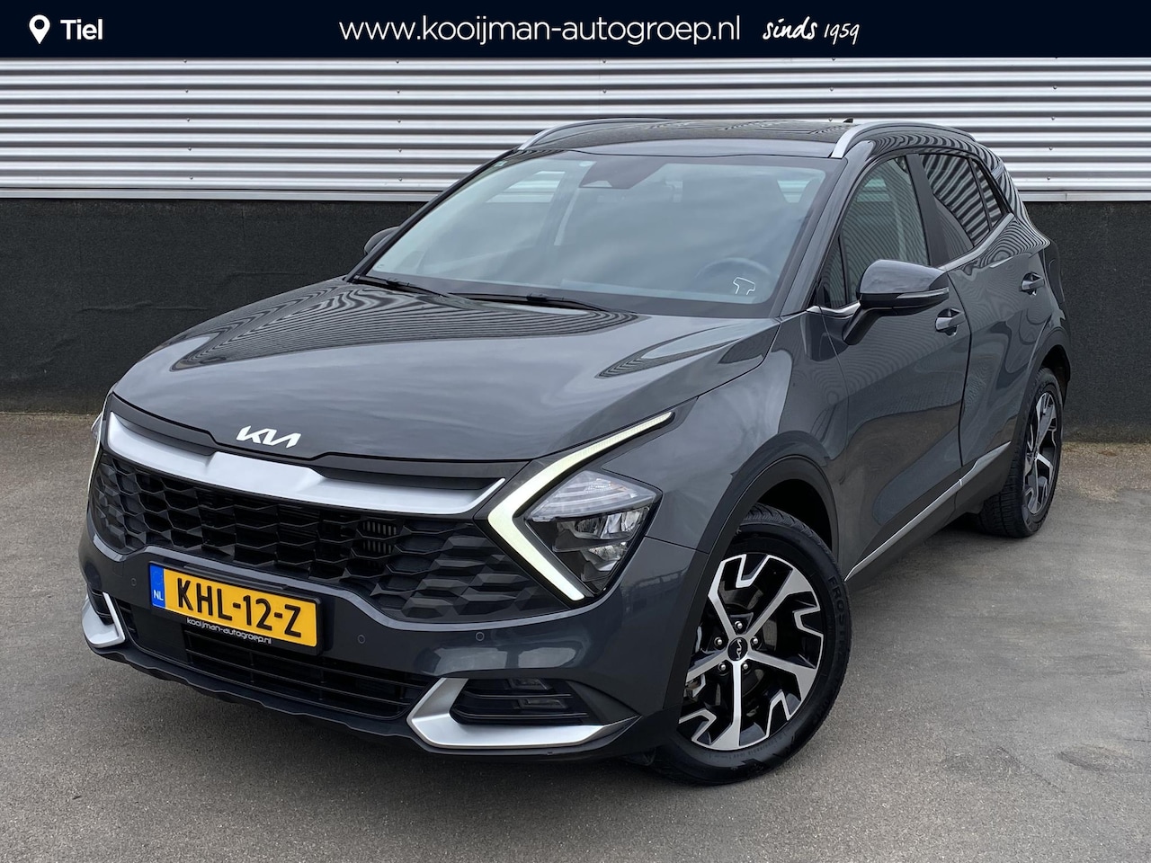 Kia Sportage - 1.6 T-GDi Hybrid DynamicLine Parkeersensoren, navigatie Appel CarPlay/Android Auto, achter - AutoWereld.nl