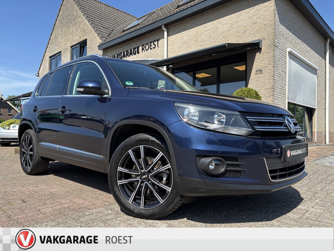Volkswagen Tiguan - 1.4 TSI Automaat Sport&Style Trekhaak / All-Seasons / Parkeersensors - AutoWereld.nl