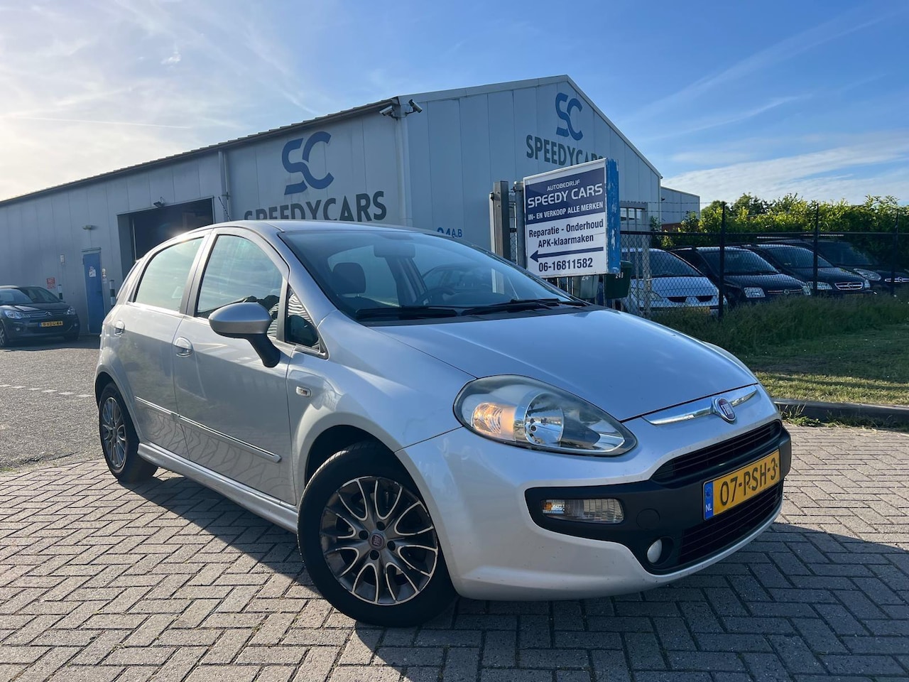 Fiat Punto Evo - 1.3 M-Jet Dynamic Airco Cruise LMV - AutoWereld.nl