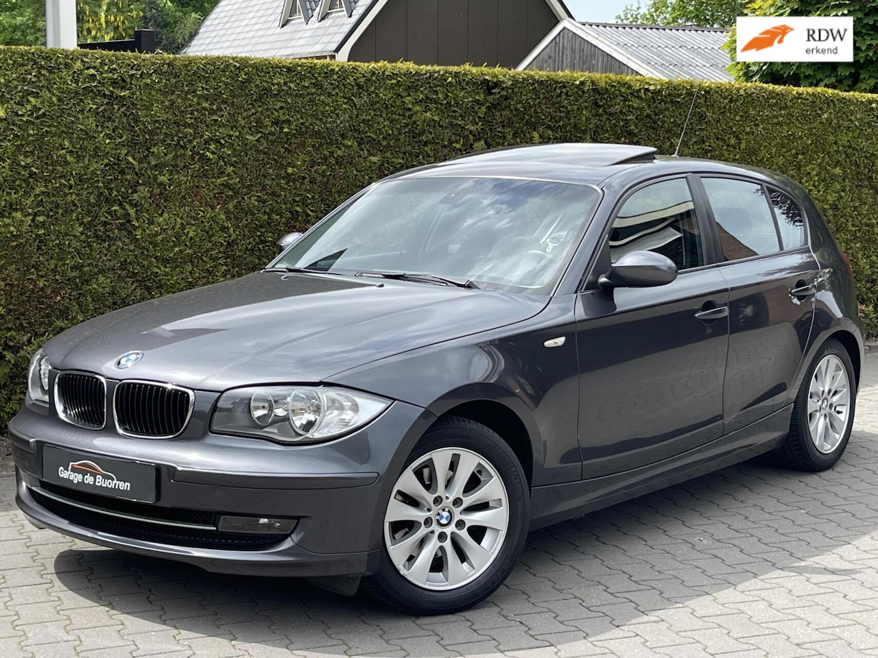 BMW 1-serie - 118d Corporate Executive | OPEN SCHUIF/KANTELDAK | TREKHAAK | CRUISE CONTROL | AIRCONDITIO - AutoWereld.nl