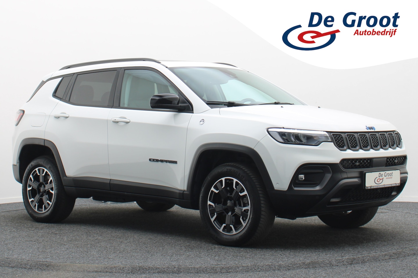 Jeep Compass - 4xe 240 Plug-in Hybrid Electric Trailhawk Panoramadak, Leer, Camera, ACC, Apple Carplay, K - AutoWereld.nl