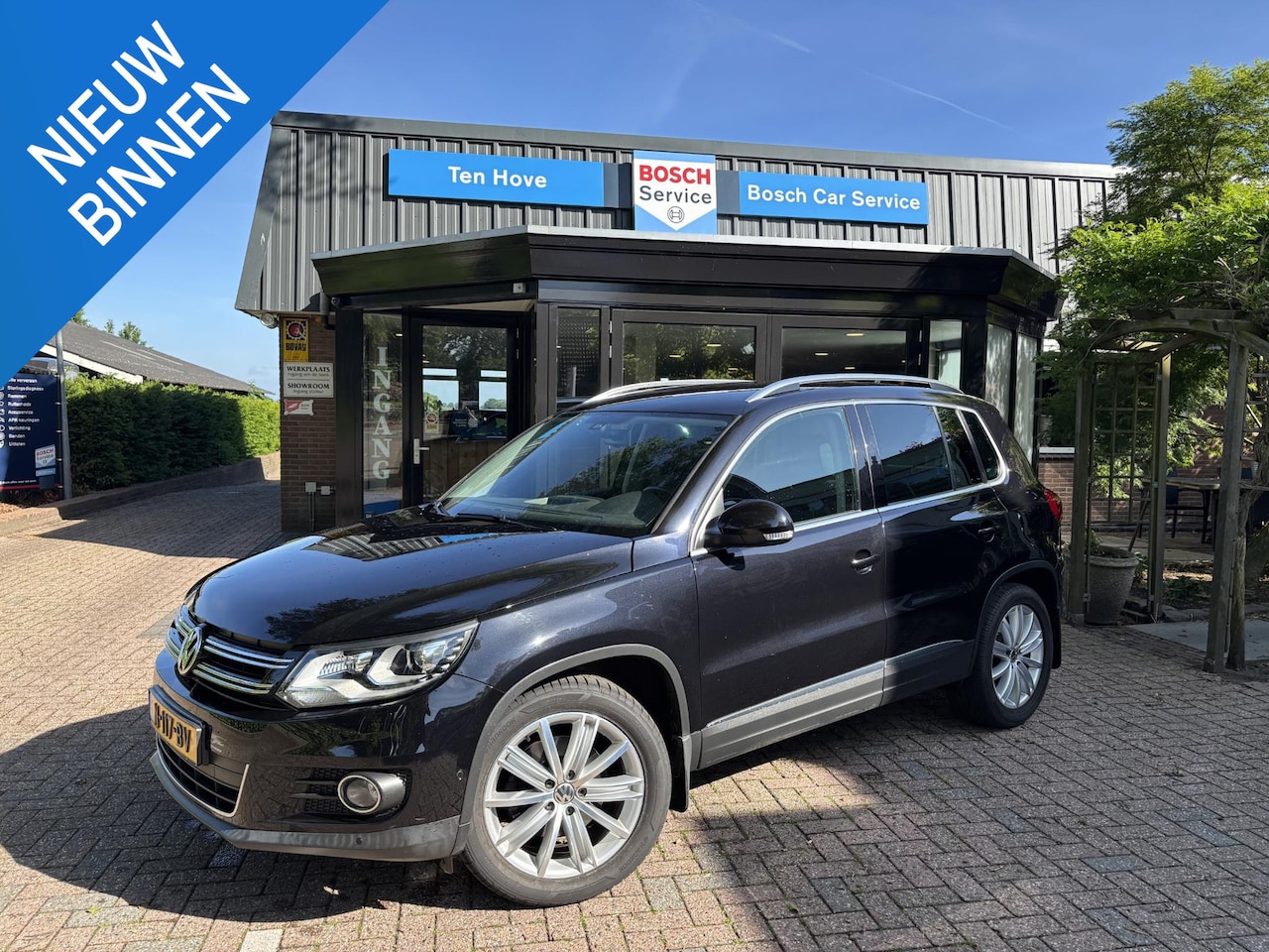 Volkswagen Tiguan - 1.4 TSI Sport&Style|Camera|Trekhaak|Xenon|Cruise C - AutoWereld.nl