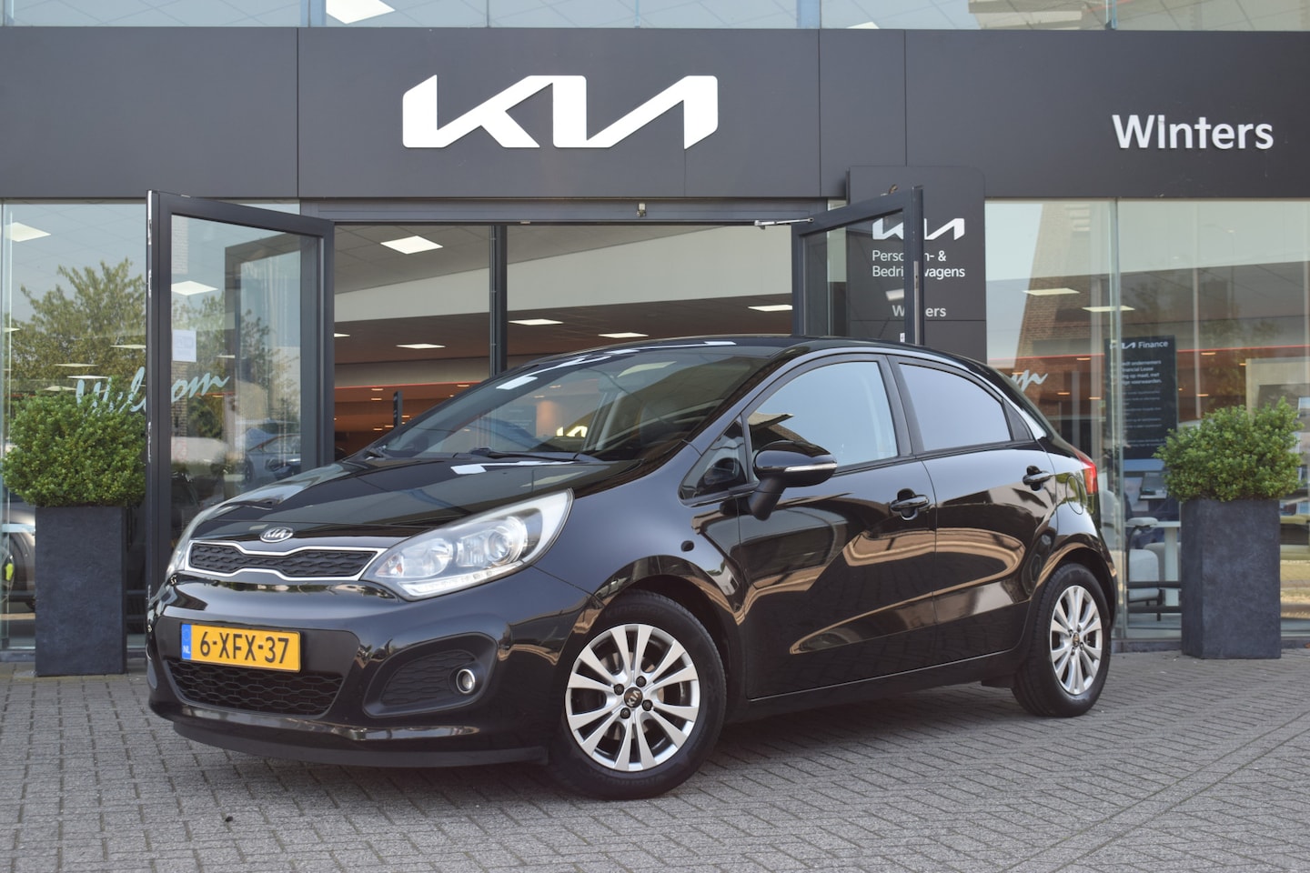 Kia Rio - 1.2 CVVT World Cup Edition | Cruise Control | Leder | Bluetooth | Airco | - AutoWereld.nl