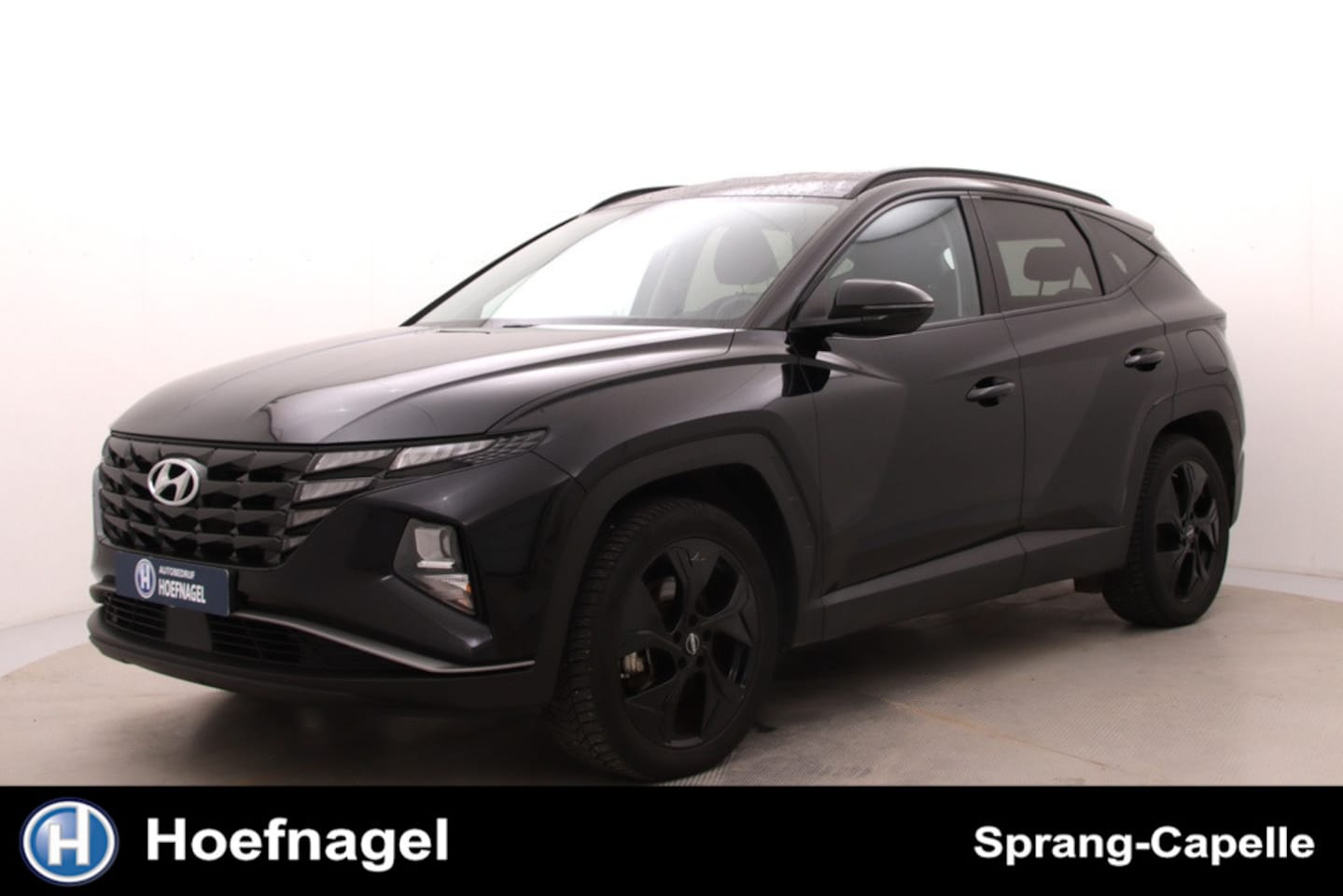 Hyundai Tucson - 1.6 T-GDI PHEV Comfort 4WD | Trekhaak | Camera | Adaptive Cruise | Stoelverwarming | CarPl - AutoWereld.nl