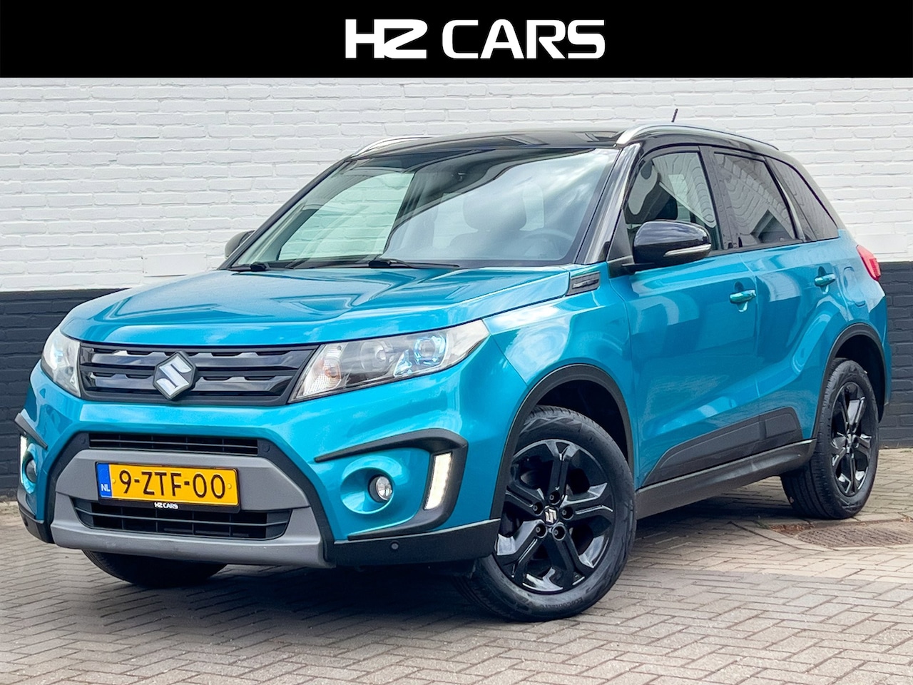 Suzuki Vitara - 1.6 High Executive/Panorama/Trekhaak/Navi/AdaptiveCruise/Leder - AutoWereld.nl