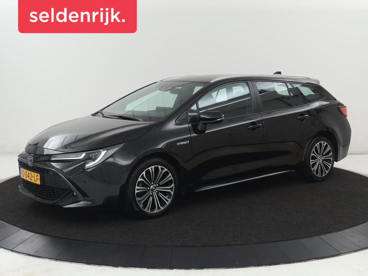 Toyota Corolla - 1.8 Hybrid Business Intro | Head-Up | Stoelverwarming | Adaptive cruise | Navigatie | Keyl - AutoWereld.nl