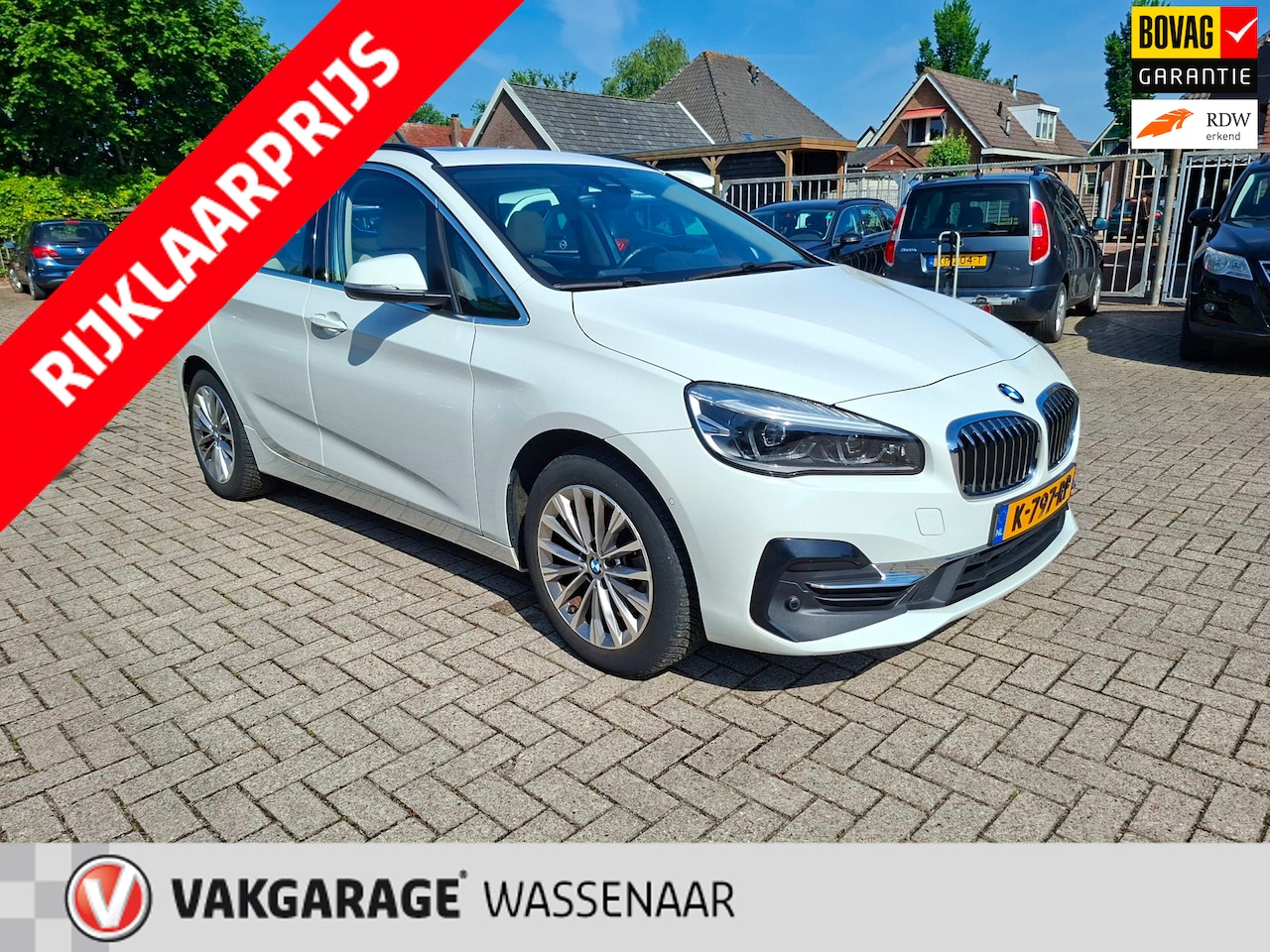 BMW 2-serie Active Tourer - 225xe iPerformance Executive plug in hybr pano leer - AutoWereld.nl