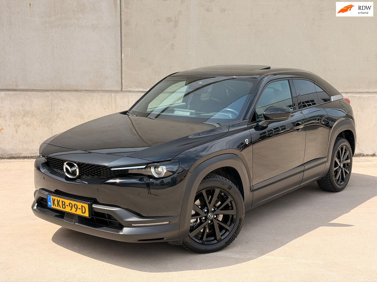 Mazda MX-30 - E-SkyActiv R-EV 170 Makoto Open dak 360 BOSE HUD CarPlay Leder 18'' - AutoWereld.nl