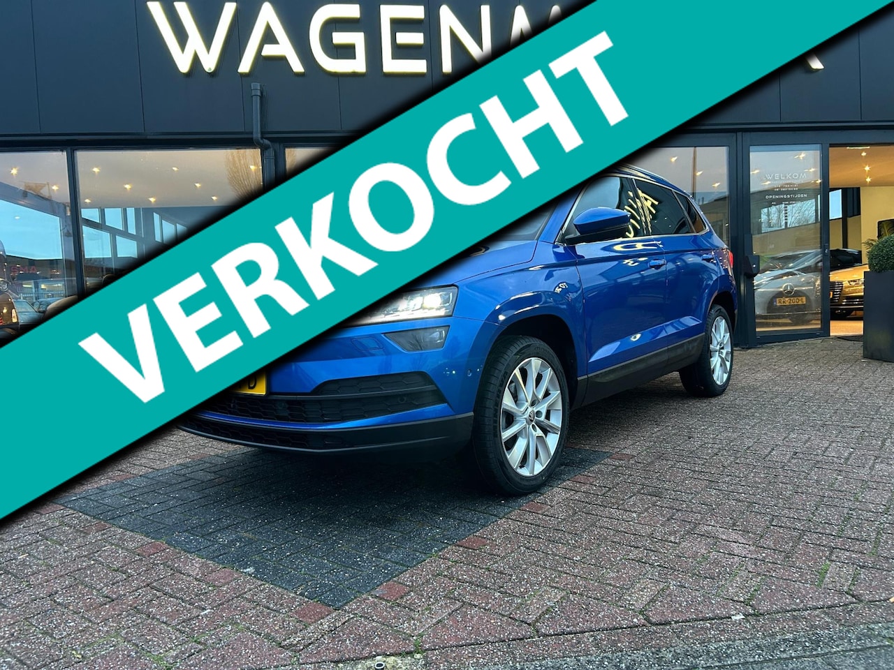 Skoda Karoq - 1.5 TSI ACT Sportline Business AUT|Clima|ACC|Navi - AutoWereld.nl