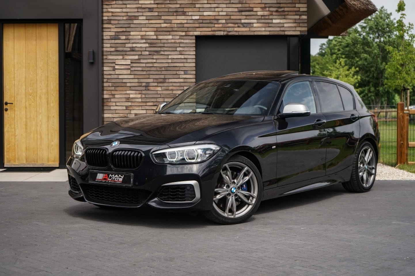 BMW 1-serie - M140i xDrive Special Edition Akrapovic - AutoWereld.nl