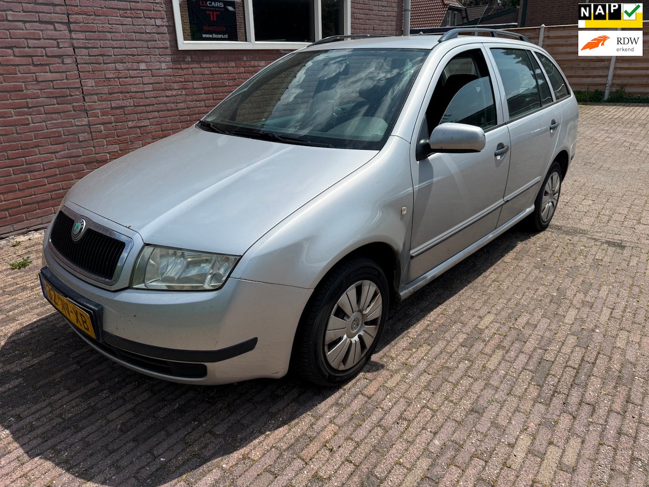 Skoda Fabia Combi - 1.4-16V Choice Airco Cruise trekhaak - AutoWereld.nl