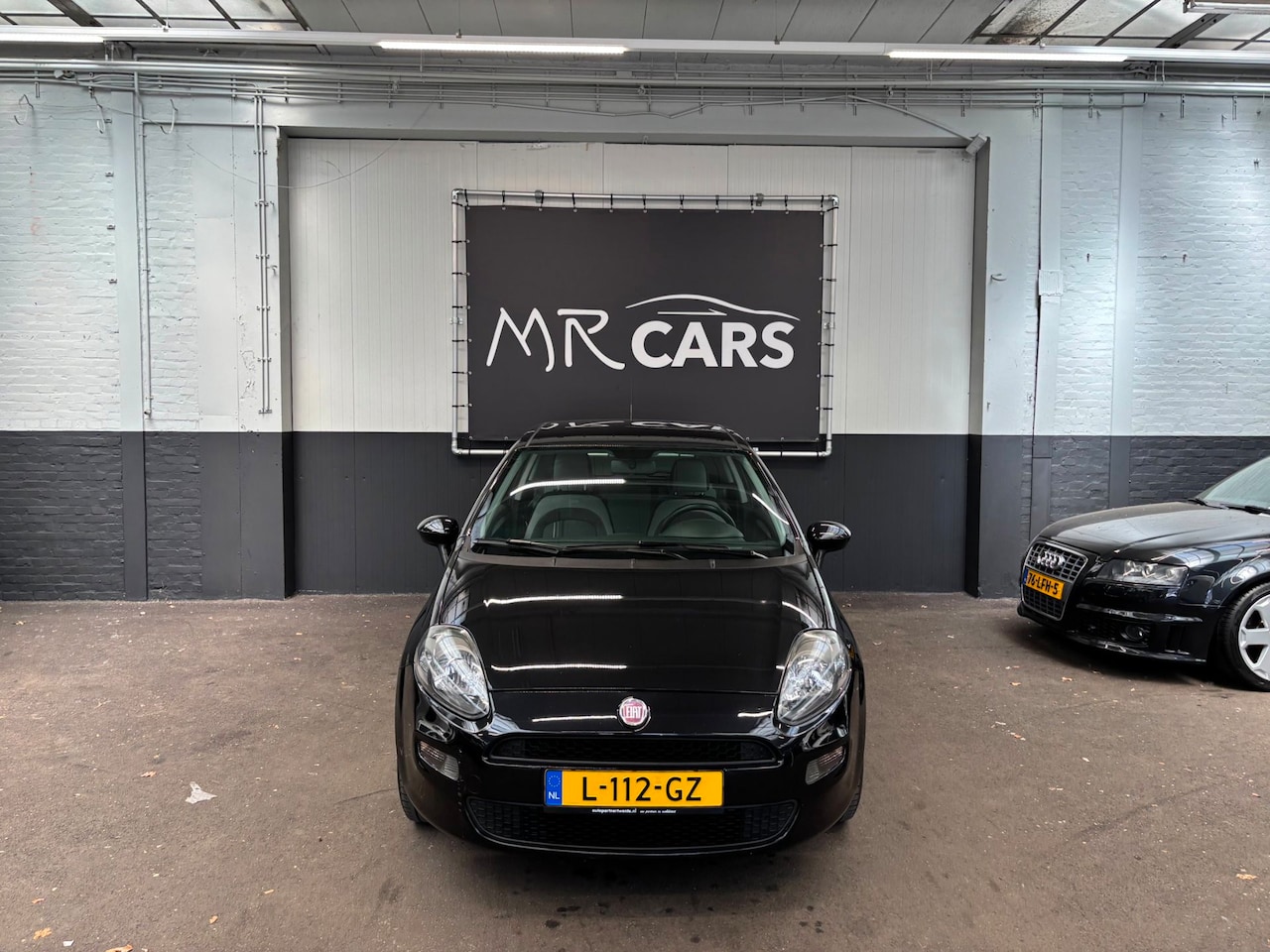 Fiat Punto Evo - 1.2 Pop airco - AutoWereld.nl