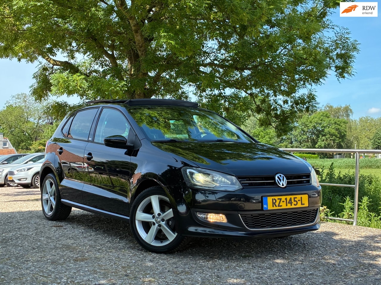 Volkswagen Polo - 1.2 TSI Highline | Schuif/kantel dak + Cruise + Clima + Stoel verw. nu € 6.975,-!!! - AutoWereld.nl