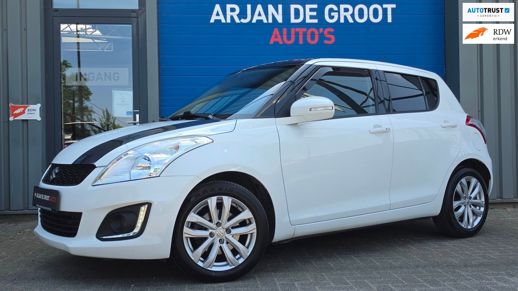 Suzuki Swift - 1.2 95PK 5Drs Exclusive Keyles Clima Cruise PDC Bleutooth - AutoWereld.nl