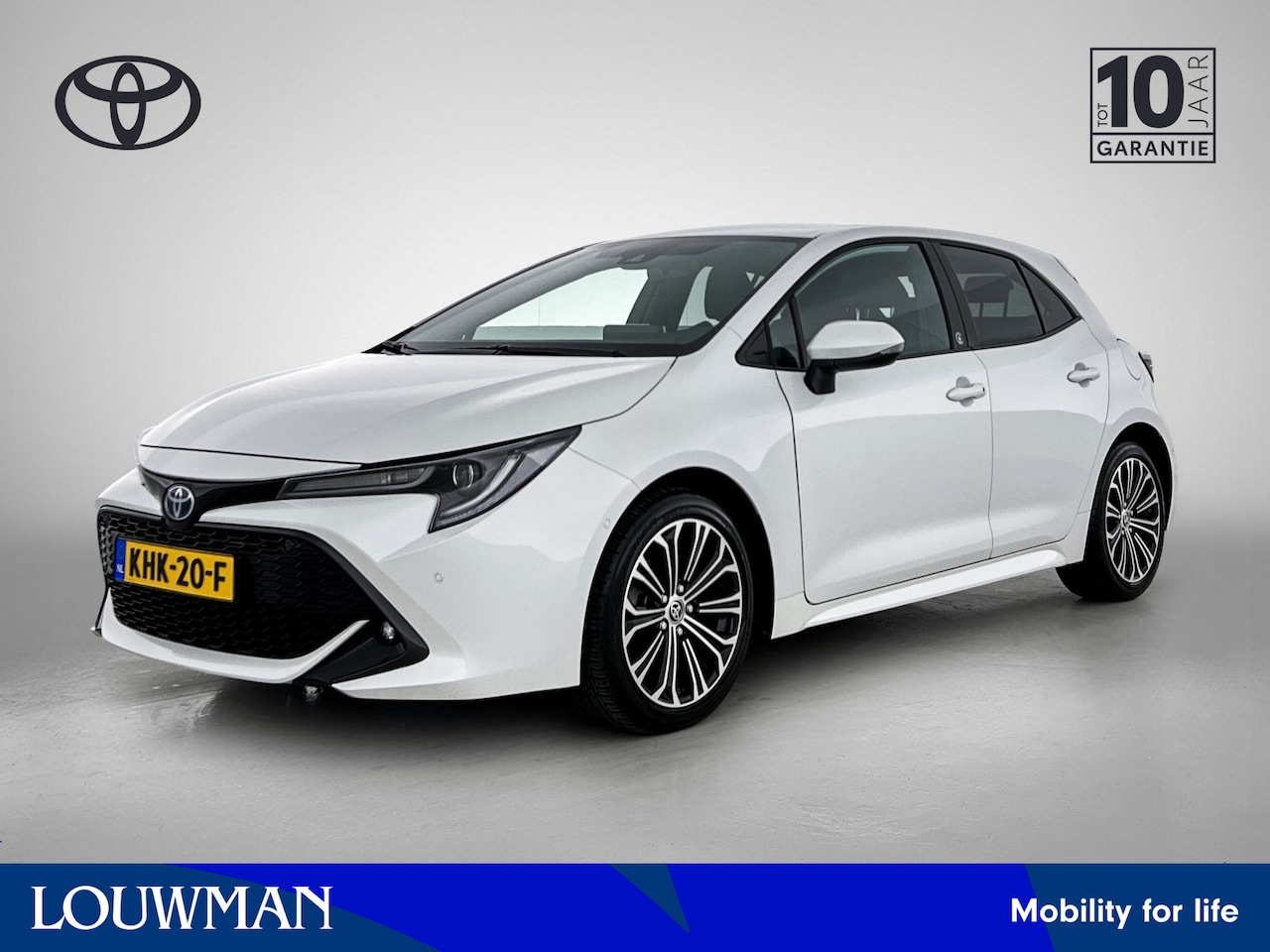 Toyota Corolla - 1.8 Hybrid Dynamic 2e set winterbanden + lichtmetalen velgen op 4e etage - AutoWereld.nl