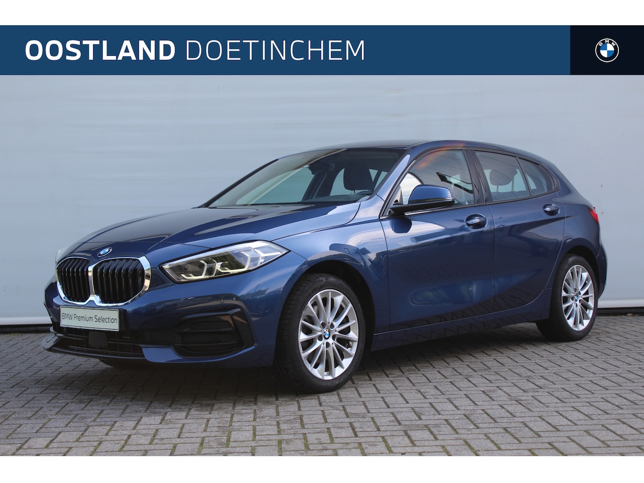 BMW 1-serie - 118i Sport line Automaat / Sportstoelen / LED / Achteruitrijcamera / Stoelverwarming - AutoWereld.nl