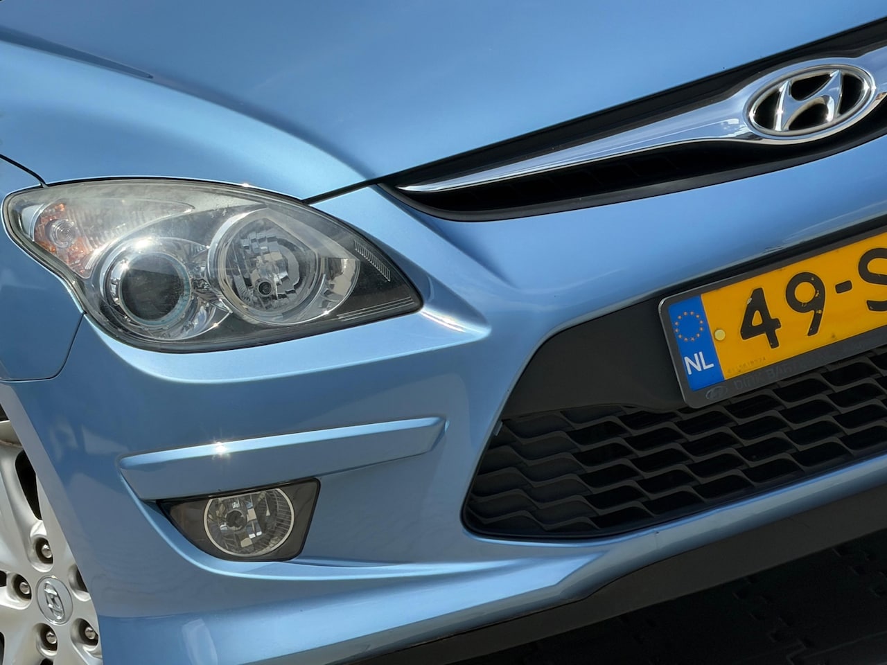 Hyundai i30 - 1.4i i-Motion | Blue Sky Metallic | Airco/LMV/Xenon - 1ste eigenaar! - AutoWereld.nl