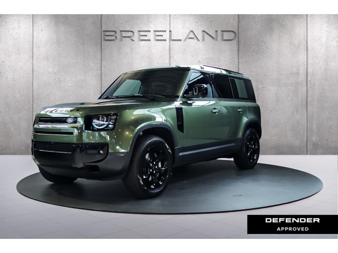 Land Rover Defender 110 - P300e 110 Forest Edition | Panoramadak | Trekhaak | Cold Climate Pack Woolstone Green/Ebon - AutoWereld.nl