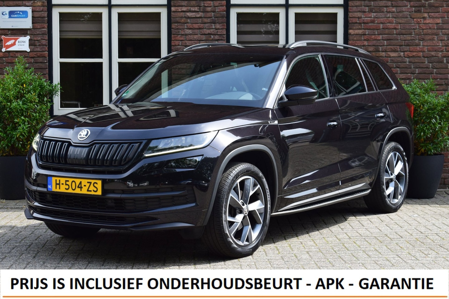Skoda Kodiaq - 1.5 TSI DSG Aut. Sportline Panoramadak | Camera | Treeplanken - AutoWereld.nl