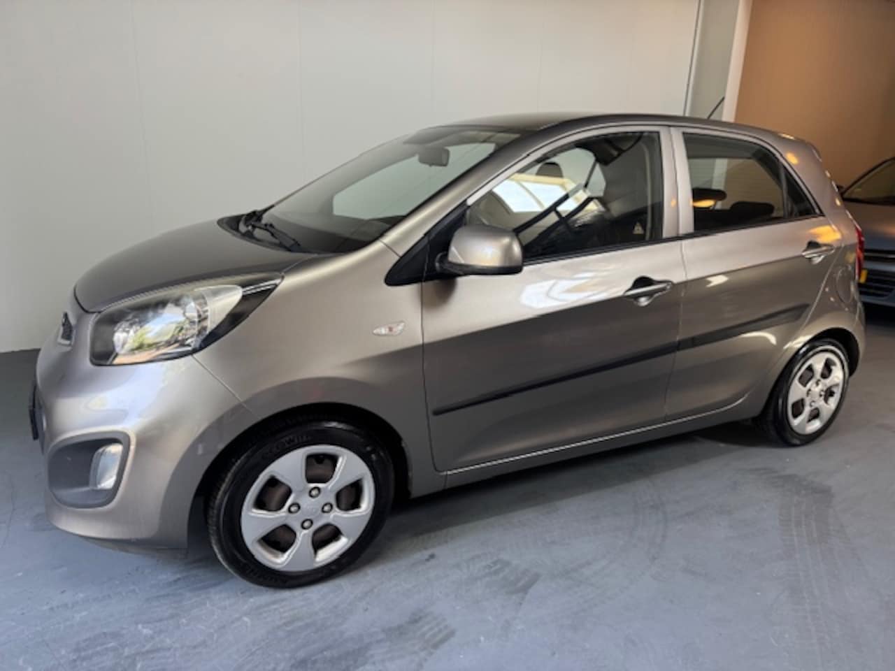 Kia Picanto - 1.0 CVVT ISG Comfort 1e eigen/navie !! - AutoWereld.nl